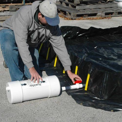 A self-bailer helps to remove water from a spill containment berm, while filtering oil and other dangerous liquids.